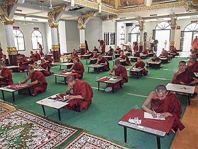 'Buddhist Monks in an Examina in a Temple in Tachileik' by Asienreisender